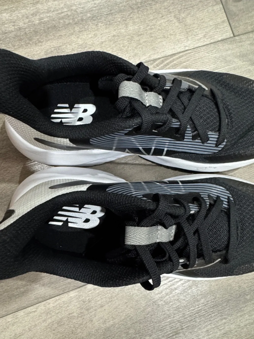 New Balance Black and White Unisex Sneakers